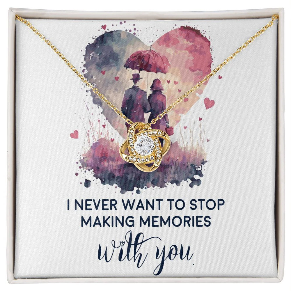 Never Stop Making Memories Infinity Knot CZ Necklace Gold Tone Standard Box